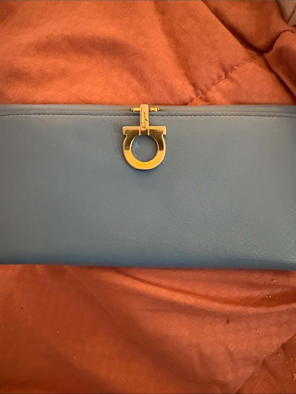 Salvatore Ferragamo Light Blue Leather Clutch with Gold Gancini